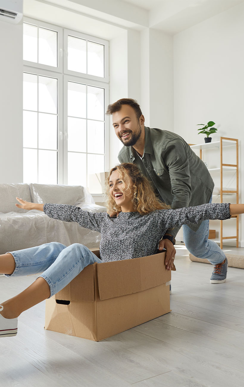 First-time home buyers celebrating at home