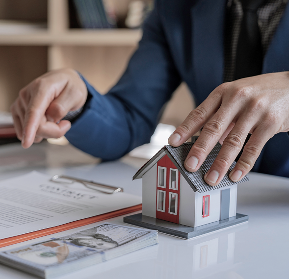 Homeowners reviewing mortgage renewal paperwork at home
